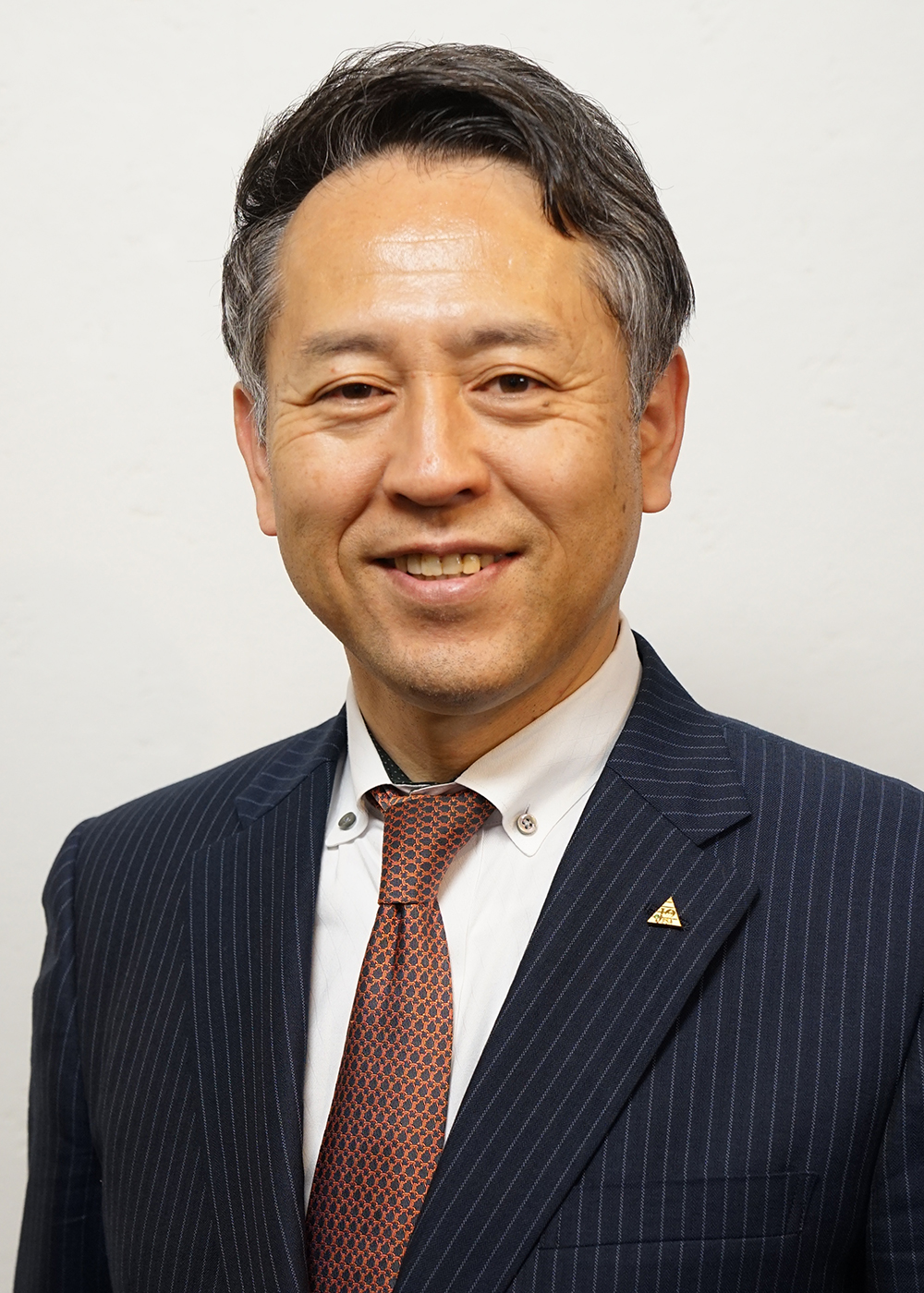 本木 賢治
